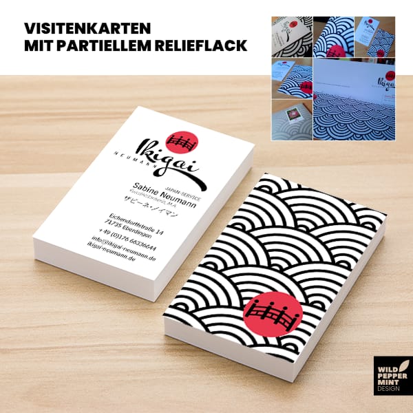 Nachhaltige Visitenkarten mit partiellem Relieflack.